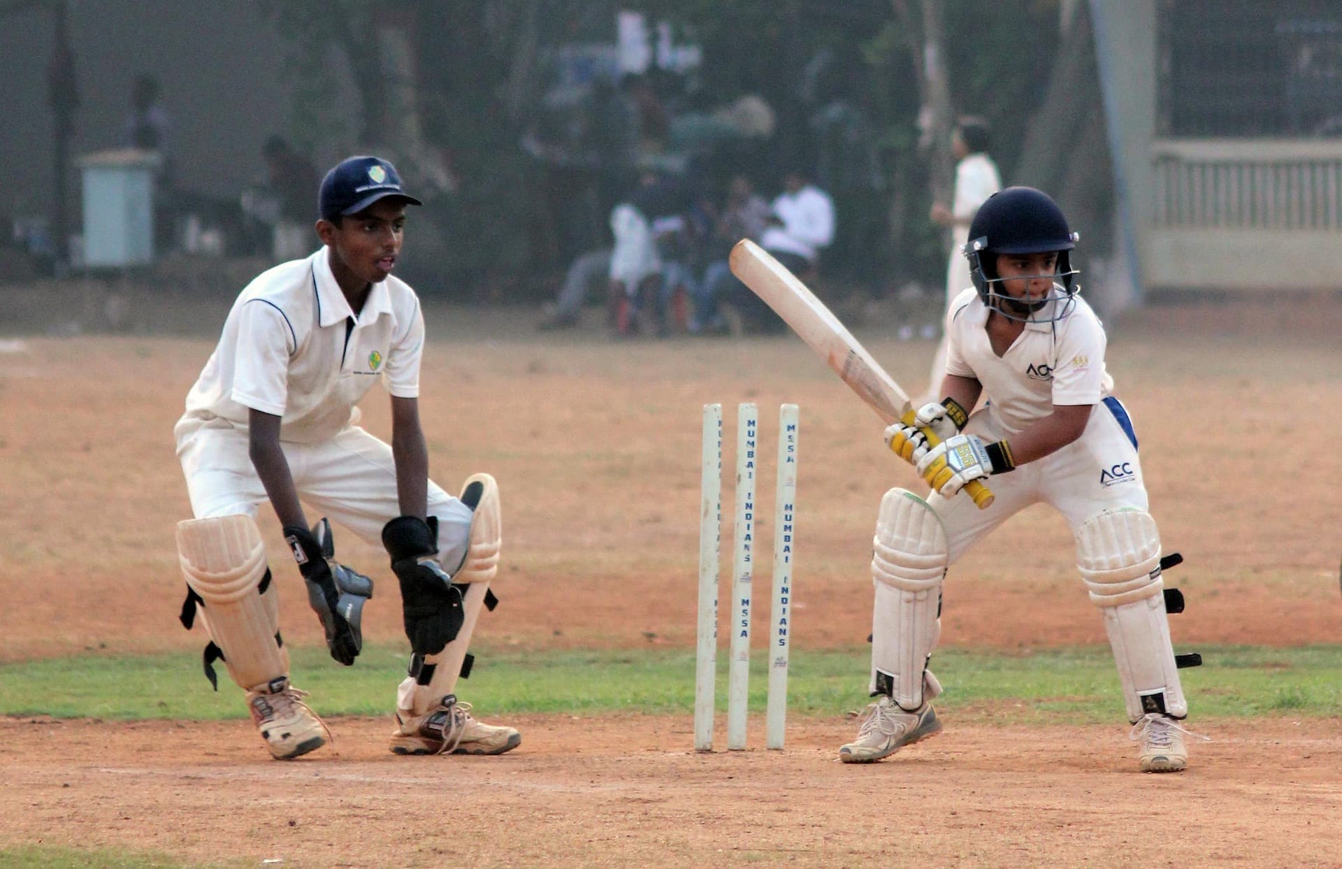 boys playing cricket